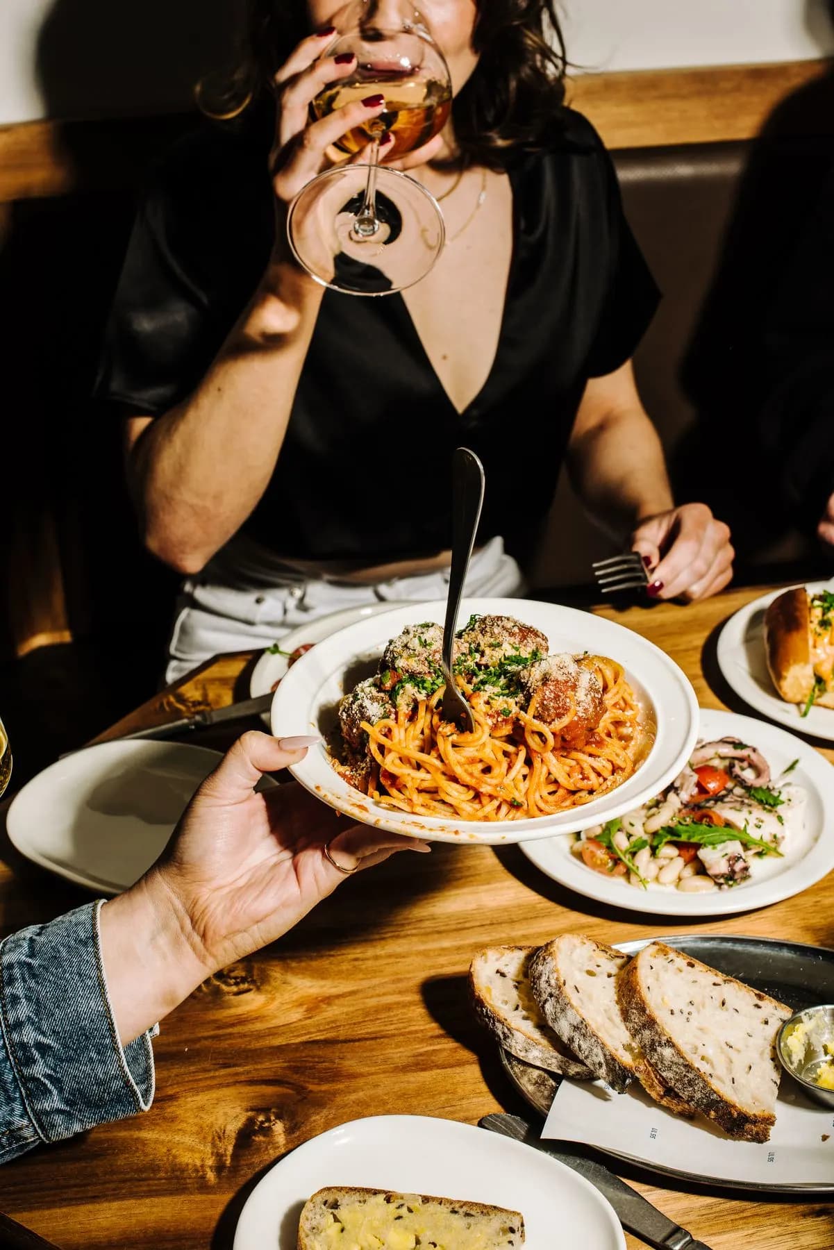 Food ordering interface showing spaghetti dish